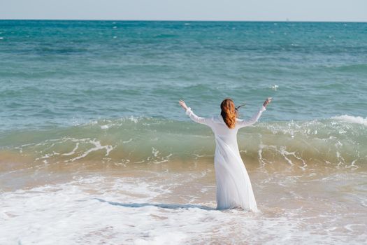 beautiful woman white dress walk beach freedom Fresh air. High quality photo
