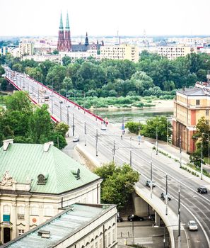 Cityscape of Warsaw, Poland, Slasko-Dabrowski bridge, Praga district behind the Vistula river