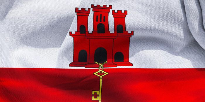 Gibraltar flag - realistic waving fabric flag