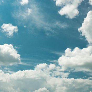 White clouds in a blue fantastic sky. Great background. horizontal