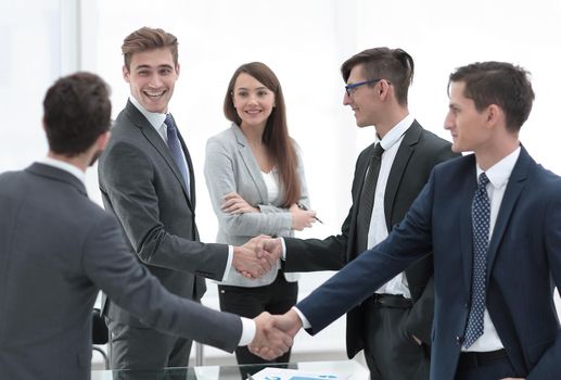 handshake business competitors before starting negotiations