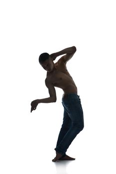 Full length silhouette of a young man dancer, isolated studio white background