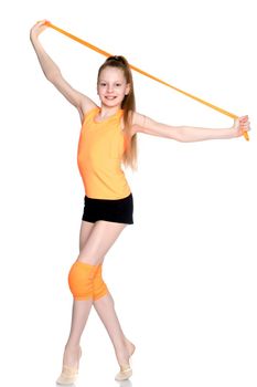 A girl gymnast performs exercises with a skipping rope. The concept of a healthy lifestyle, sports education of a child, Happy childhood. Isolated on white background.