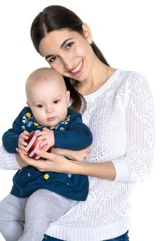 Happy young mother with a little daughter and toy Christmas tree on her hands on Christmas Eve. The concept of a family holiday, a happy childhood. Isolated on white background.