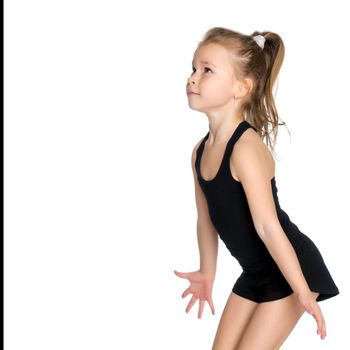 The little girl is catching the ball. The concept of relaxation, fitness and gymnastics. Isolated on white background.