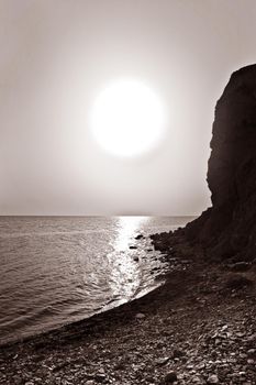 Vertical monochrome photo of beautiful bay. Black sea