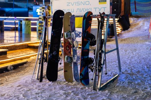 A rack packed with skis and poles after a day of skiing Bukovel, UKRAINE - 31 January 2021: