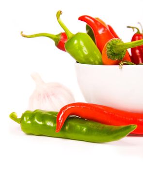 Red chili peppers over a white background