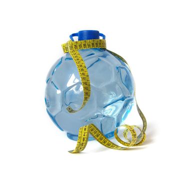 Plastic water bottle and tape measure isolatet on white