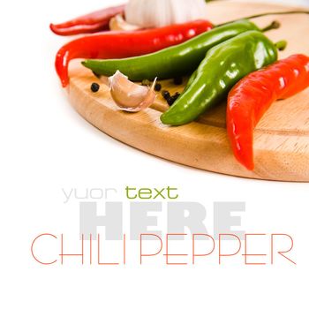 Red chili peppers over a white background