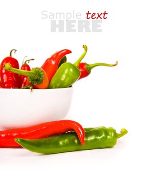 Red chili peppers over a white background
