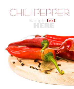 Red chili peppers over a white background