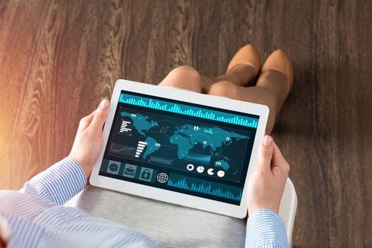 close-up business woman with computer tablet on lap