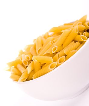 raw noodles over a white background close up