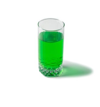 big glass full of sparking green tarkhun, homemade in Georgia, traditional drink, authentic recipe