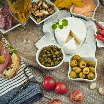 National Spanish tapas on a wooden background