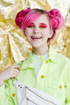 portrait of a cheerful woman pink hair hipster fashion. High quality photo