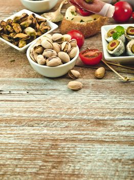 National Spanish tapas on a wooden background