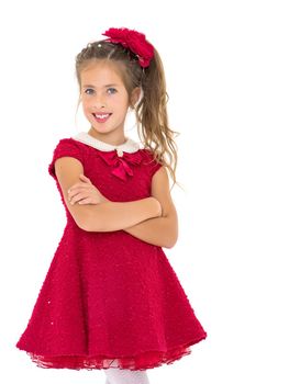 Beautiful little girl In a red dress. close-up. The concept of beauty and fashion, happy childhood. Isolated on white background.