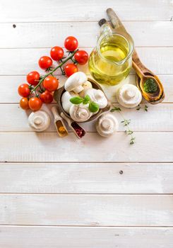 food ingredients for cooking vegetarian food on a wooden background