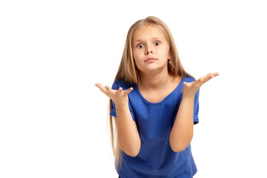 Portrait of adorable little girl isolated on a white background. in blue t-short with long white hair disappointed