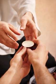 Chinese tea ceremony is perfomed by tea master in kimono