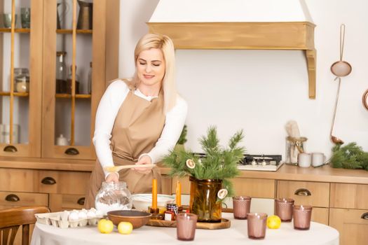 Christmas bakery. Woman cooking before christmas. Festive food, cooking process, family culinary, Christmas and New Year traditions concept