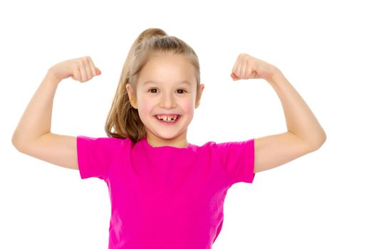 Beautiful little girl shows her muscles. The concept of strength, health and sport. Isolated on white background.