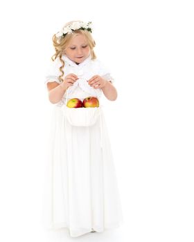 Little girl with a basket of apples. The concept of healthy eating, happy childhood. Isolated on white background.