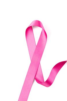 Pink breast cancer ribbon isolated on white background