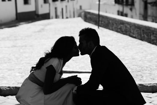 Just married couple together in urban background