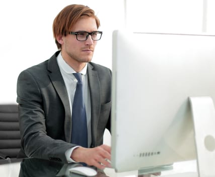 businessman working on a computer in a modern office.photo with copy space