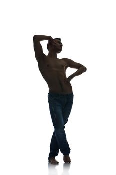 Full length silhouette of a young man dancer, isolated studio white background