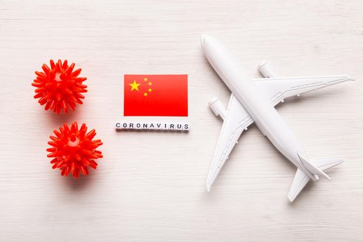 Flight ban and closed borders for tourists and travelers with coronavirus covid-19. Airplane and flag of China on a white background. Coronavirus pandemic concept.