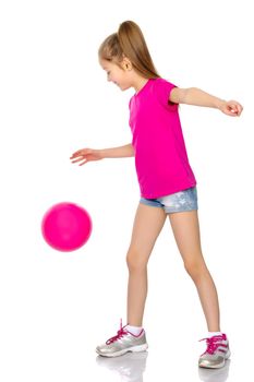 A charming little girl is engaged in fitness with a ball. The concept of gymnastics, health and sports. Isolated on white background.