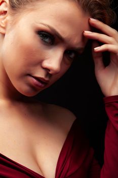 young sensual blond woman posing on black background, lifestyle people concept close up