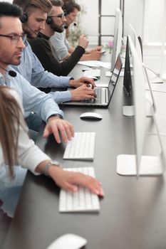 business team of the business center working in the office . vertical photo