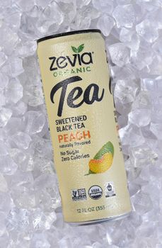 IRIVNE, CALIFORNIA - 17 JUL 2021: A can of Zevia Organic Peach Flavored Tea, in a bed of ice.