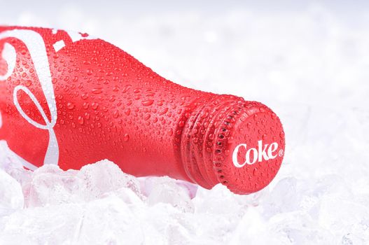 IRVINE, CALIFORNIA - JULY 10, 2017: Coca-Cola Aluminum Bottle on ice. Coke first introduced the aluminum bottle in 2015 claiming it is their hardest package to produce.