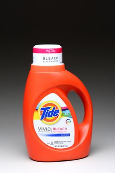 IRVINE, CA - January 11, 2013: A 50 ounce bottle of Tide Plus Vivid Bleach Laundry Detergent. Tide has more than 30% of the liquid-detergent market, with more than twice as much in sales as the second most-popular brand.