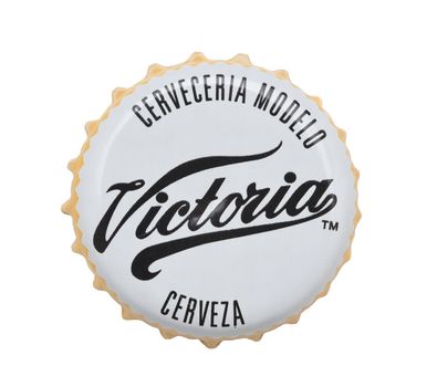 IRVINE, CALIFORNIA - 4 JUNE 2020: Closeup of a Victoria beer bottle cap on white.