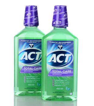 IRVINE, CA - January 05, 2014: Two bottles of ACT Total Care Anticavity Mouthwash. Two 1 liter bottles of the oral hygiene mouthwash with fluoride.