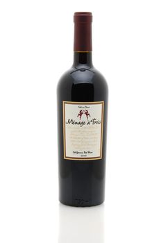 IRVINE, CA - January 11, 2013: A 750 ml bottle of Menage a Trois California Red Wine. Produced by the award winning winery Folie a Deux in Sonoma.