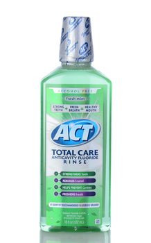 IRVINE, CA - January 05, 2014: A bottle of ACT Total Care Anticavity Mouthwash. An 18 oz bottle of the oral hygiene mouthwash with fluoride.