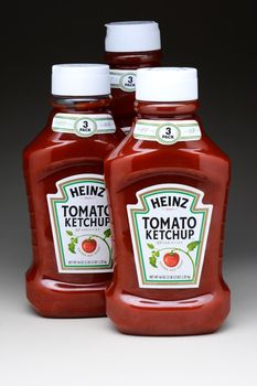 IRVINE, CA - January 11, 2013: Three 44 ounce bottles of Heinz Tomato Ketchup. Heinz is the most popular Ketchup, selling over 650 million bottles in the year 2012.
