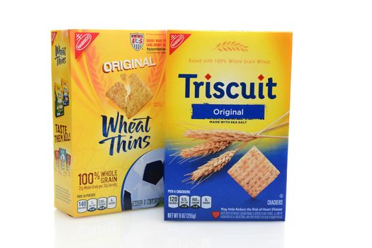 IRVINE, CA - SEPTEMBER 08, 2014: Boxes of Nabisco Wheat Thins and Triscuit Crackers. Originally known as the National Biscuit Company, Nabisco is an American manufacturer of cookies and snacks. 