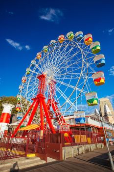 Sydney, Australia - February 8 2015: A view towards Sydney CBD from a boardwalk next to Luna Park in Sydney, Australia