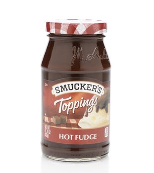 IRVINE, CA - SEPTEMBER 12, 2014: Smucker's Hot Fudge Topping. Smucker's was founded in 1897 producing fruit spreads, ice cream toppings, beverages, shortening, natural peanut butter, and more.