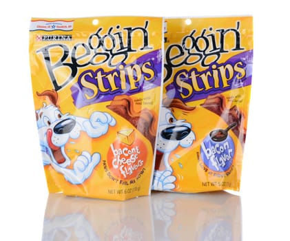 IRVINE, CA - January 05, 2014: Two packs of Purina Beggin Strips. One Bacon & Cheese Flavor and one Bacon Flavor product are shown. Purina is a leading pet food manufacturer.