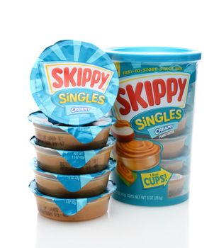 IRVINE, CA - SEPTEMBER 12, 2014: Skippy Peanut Butter Singles vertical with contents stacked. Skippy, introduced in 1933 and owned by Hormel, is the 2nd largest peanut brand in the world.